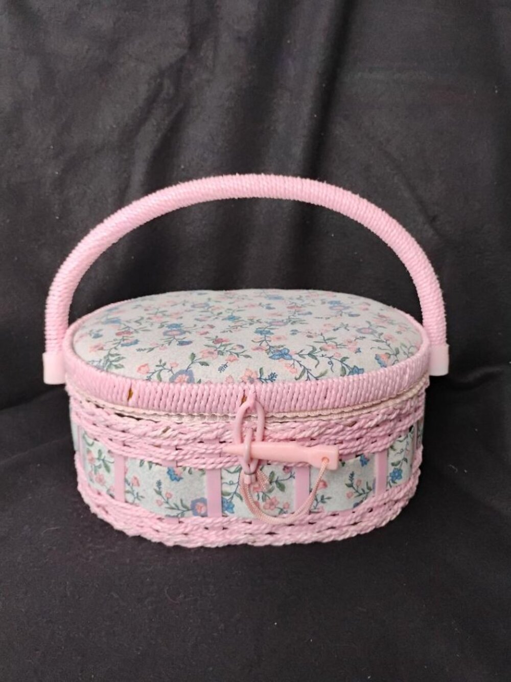 Vintage sewing basket with flower design and pink trim